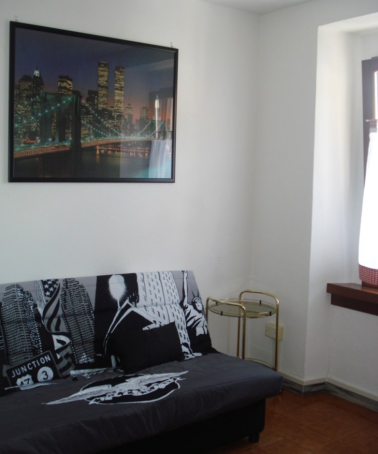 appartamento affitto comano soggiorno